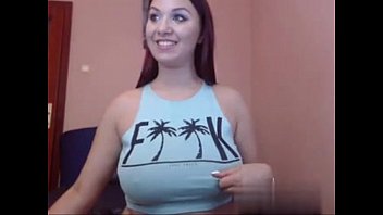 big tits redhead shows off her curves on web cam on erickdarkebadass com