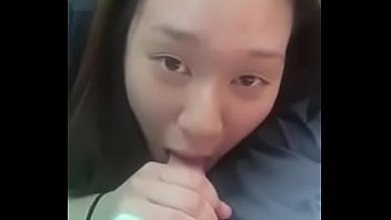 Asian Girl Gives BJ to Nerd While Friend Watches